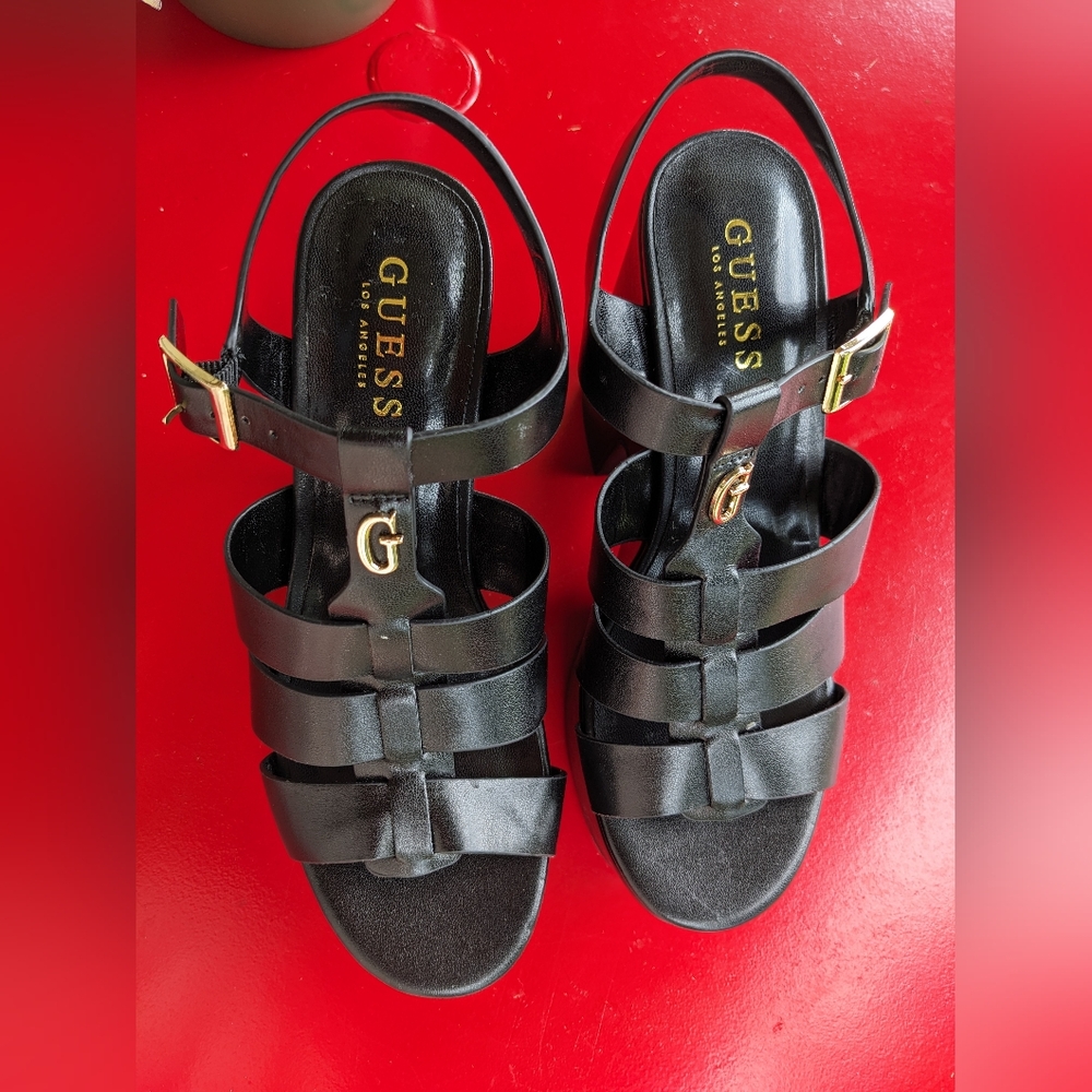 Guess black flatform wedge in size 8M, Like New.